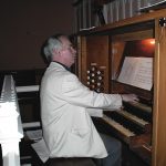 John playing the Organ