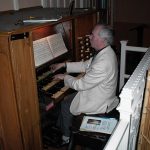 John playing the Organ